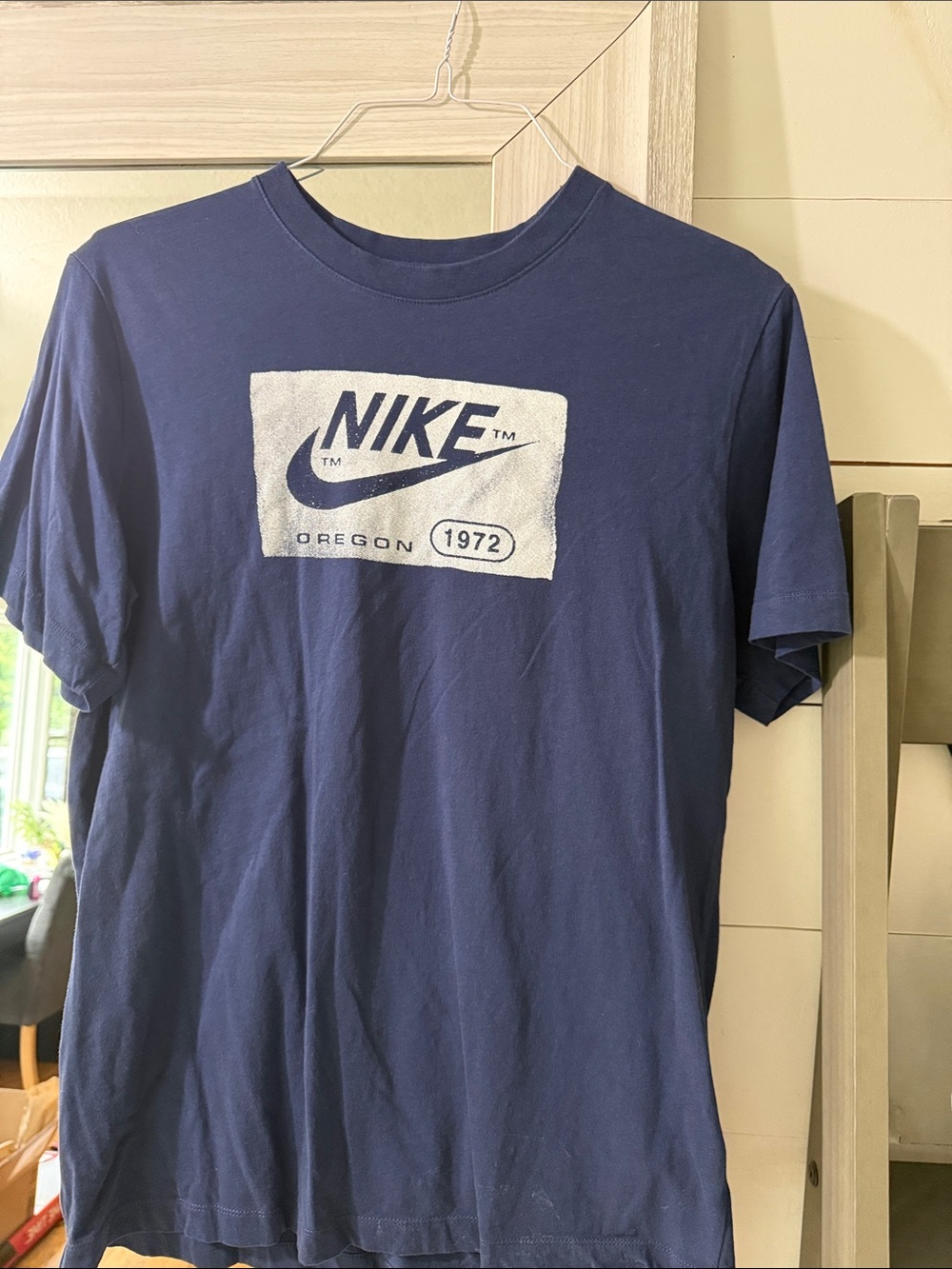 Nike Men's Navy Short Sleeve Graphic Tee with White Logo